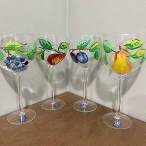 Set of 4 Wine Glass with hand painted flowers on them.